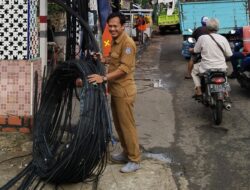 Dinas SDABMBK Potong Kabel di Jalan Merpati Raya